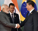 Modi, Xi hold ’forward-looking’ talks, call for peace in border areas